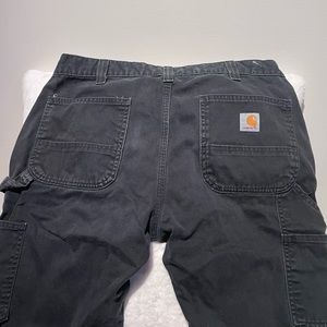 Men’s Carhartt black carpenter style pants. 34 x 32